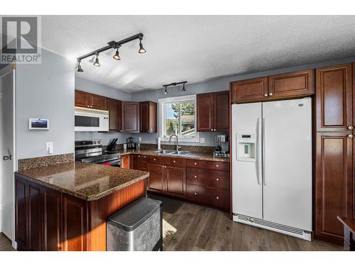 453 Robin Drive, Barriere, BC - Indoor Photo Showing Kitchen With Double Sink