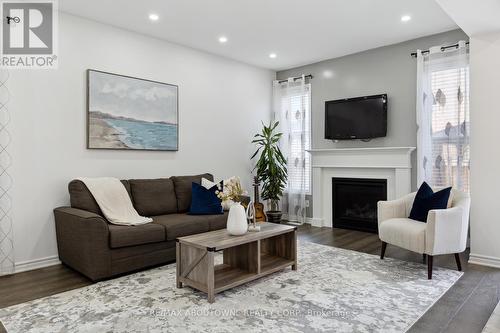 879 Hickory Crescent, Milton, ON - Indoor Photo Showing Living Room With Fireplace