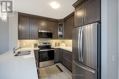 119 - 830 Megson Terrace, Milton, ON - Indoor Photo Showing Kitchen With Double Sink With Upgraded Kitchen