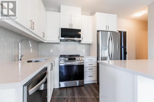 116 - 480 Gordon Krantz Avenue, Milton, ON - Indoor Photo Showing Kitchen With Stainless Steel Kitchen With Upgraded Kitchen