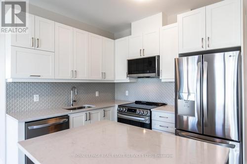 116 - 480 Gordon Krantz Avenue, Milton, ON - Indoor Photo Showing Kitchen With Stainless Steel Kitchen With Upgraded Kitchen