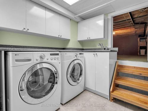 23 Rustywood Dr, Toronto, ON - Indoor Photo Showing Laundry Room