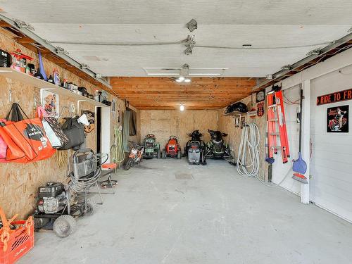 Garage - 111 Rg Ste-Claire, Sainte-Anne-Des-Plaines, QC - Indoor Photo Showing Garage