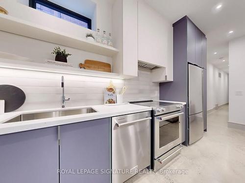 Lower-82 Gough Ave, Toronto, ON - Indoor Photo Showing Kitchen With Upgraded Kitchen