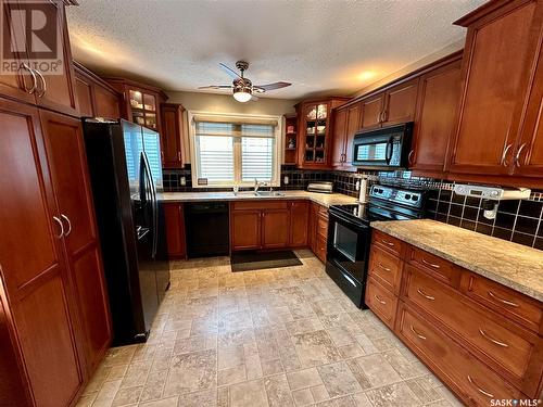 1741 Centennial Crescent, North Battleford, SK - Indoor Photo Showing Kitchen With Double Sink