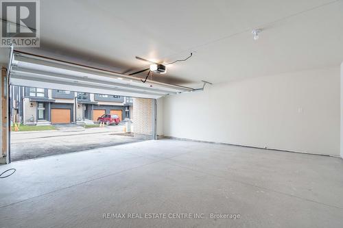 13 - 2273 Turnberry Road, Burlington, ON - Indoor Photo Showing Garage