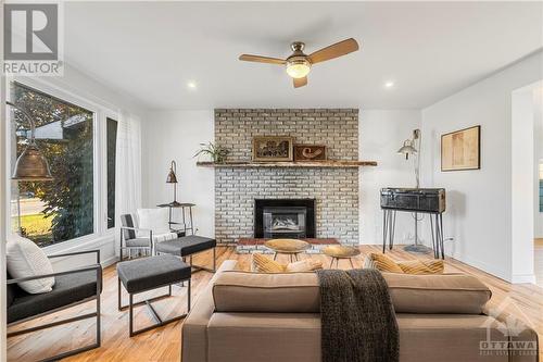 6233 Perth Street, Ottawa, ON - Indoor Photo Showing Living Room With Fireplace