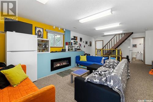 809 Byng Avenue, Wakaw Lake, SK - Indoor Photo Showing Living Room With Fireplace