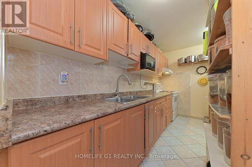 1039 - 100 Mornelle Court, Toronto, ON - Indoor Photo Showing Kitchen With Double Sink