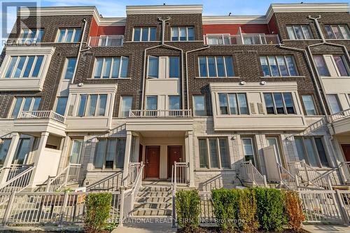 15 - 125 Long Branch Avenue, Toronto, ON - Outdoor With Facade