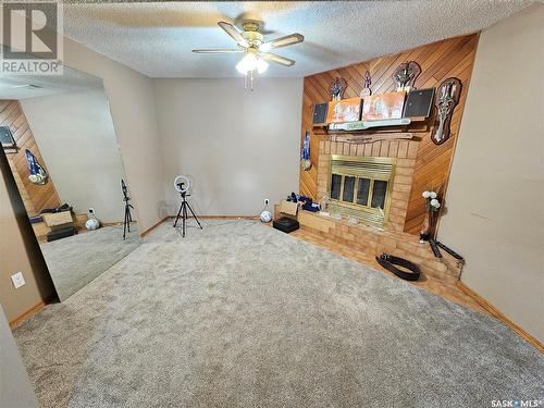 1154 Prince Charles Place, Moose Jaw, SK - Indoor Photo Showing Other Room With Fireplace