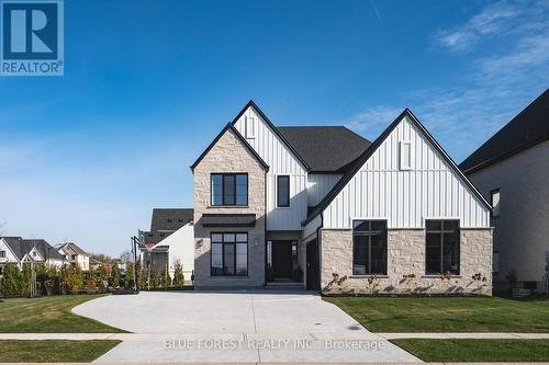 102 Edgewater Boulevard, Middlesex Centre (Komoka), ON - Outdoor With Facade