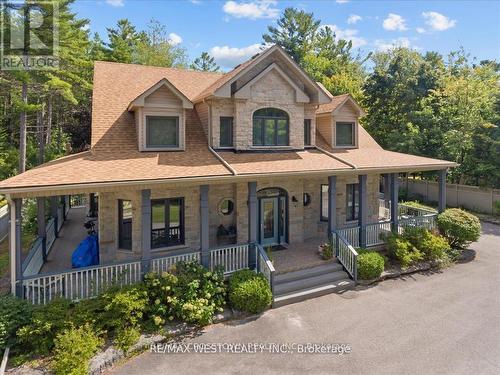 61 Earl Street, Wasaga Beach, ON - Outdoor With Deck Patio Veranda With Facade