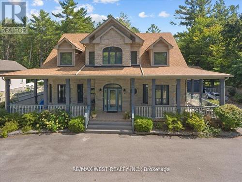 61 Earl Street, Wasaga Beach, ON - Outdoor With Deck Patio Veranda With Facade