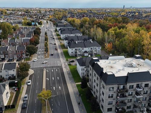 Photo aÃ©rienne - 103-2020 100E Avenue, Laval (Chomedey), QC - Outdoor With View