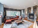 Salon - 3295 Rue Des Sous-Bois, Sherbrooke (Brompton/Rock Forest/Saint-Élie/Deauville), QC  - Indoor Photo Showing Living Room With Fireplace 