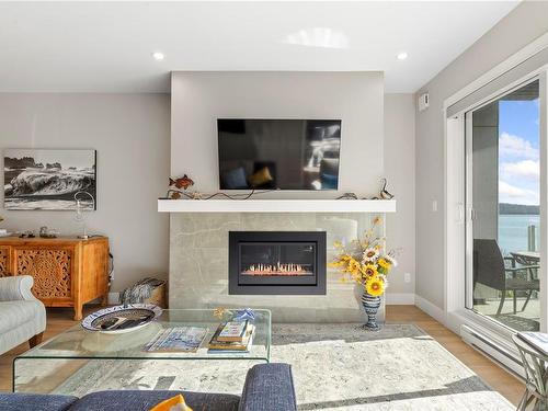 306-1820 Maple Ave South, Sooke, BC - Indoor Photo Showing Living Room With Fireplace