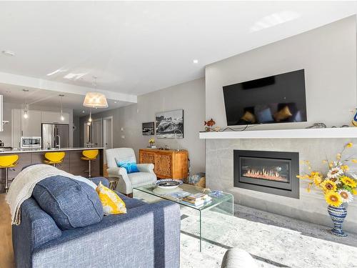 306-1820 Maple Ave South, Sooke, BC - Indoor Photo Showing Living Room With Fireplace