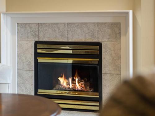 19-2022 Pacific Way, Kamloops, BC - Indoor Photo Showing Other Room With Fireplace