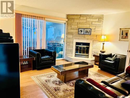 1941 Hillcrest Place, Swift Current, SK - Indoor Photo Showing Living Room With Fireplace