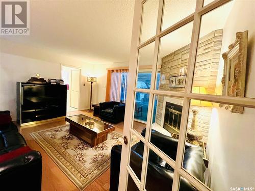 1941 Hillcrest Place, Swift Current, SK - Indoor Photo Showing Living Room With Fireplace