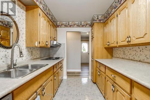 61 Beaufort Crescent, Tiny, ON - Indoor Photo Showing Kitchen With Double Sink