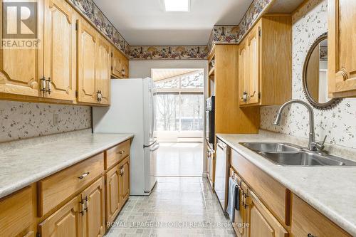 61 Beaufort Crescent, Tiny, ON - Indoor Photo Showing Kitchen With Double Sink