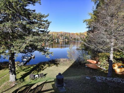 FaÃ§ade - 570 Ch. Du Lac-Beloeil, Saint-Côme, QC - Outdoor With Body Of Water With View