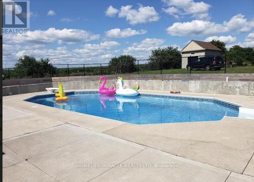 2214 Wanless Drive, Brampton, ON - Outdoor With In Ground Pool