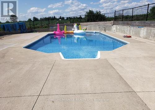 2214 Wanless Drive, Brampton, ON - Outdoor With In Ground Pool