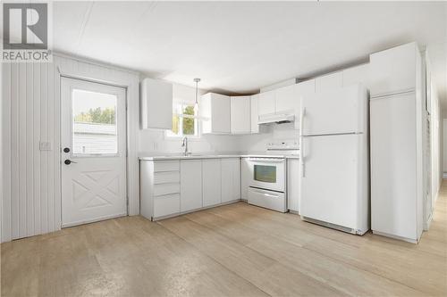 New vinyl plank flooring throughout - 31 Robert Colin Lane, Cobden, ON - Indoor Photo Showing Kitchen