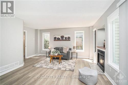 53 San Remo, Ottawa, ON - Indoor Photo Showing Living Room With Fireplace