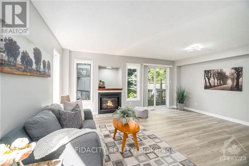 53 San Remo, Ottawa, ON - Indoor Photo Showing Living Room With Fireplace