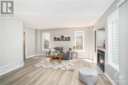 53 San Remo Private, Ottawa, ON - Indoor Photo Showing Living Room With Fireplace