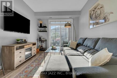 208 - 84 Aspen Springs Drive, Clarington (Bowmanville), ON - Indoor Photo Showing Living Room