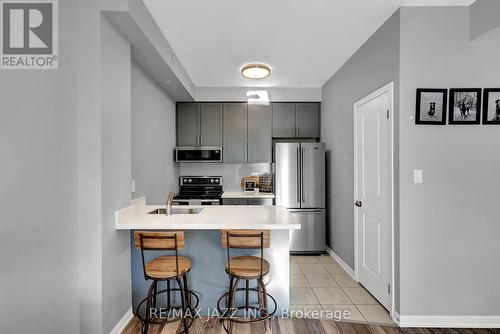 208 - 84 Aspen Springs Drive, Clarington (Bowmanville), ON - Indoor Photo Showing Kitchen