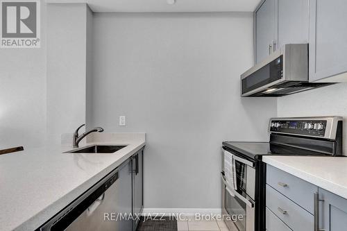 208 - 84 Aspen Springs Drive, Clarington (Bowmanville), ON - Indoor Photo Showing Kitchen