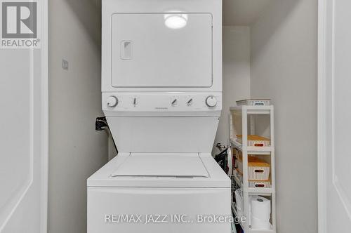 208 - 84 Aspen Springs Drive, Clarington (Bowmanville), ON - Indoor Photo Showing Laundry Room