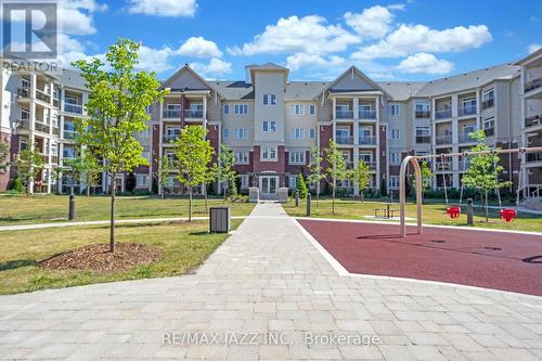 208 - 84 Aspen Springs Drive, Clarington (Bowmanville), ON - Outdoor With Facade