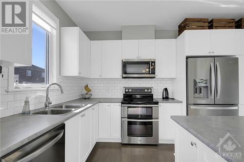 453 Central Park Boulevard, Russell, ON - Indoor Photo Showing Kitchen With Double Sink With Upgraded Kitchen