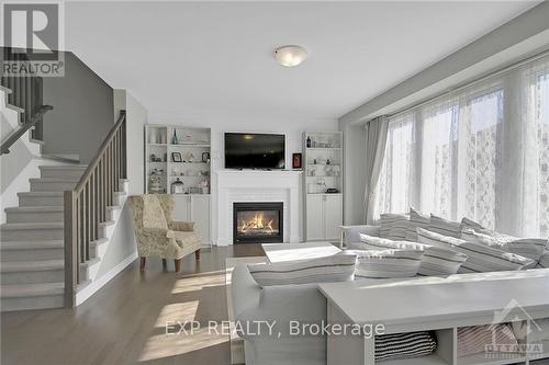 453 Central Park Boulevard, Prescott And Russell, ON - Indoor Photo Showing Living Room With Fireplace