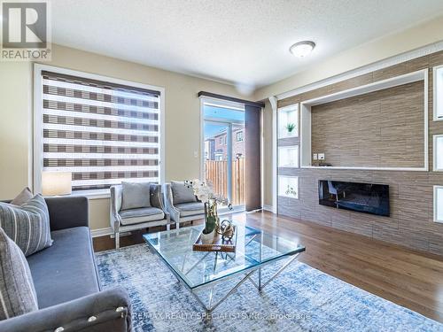 12 Merrybrook Trail, Brampton, ON - Indoor Photo Showing Living Room With Fireplace