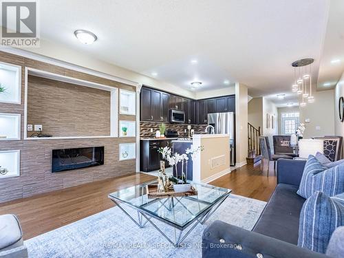 12 Merrybrook Trail, Brampton, ON - Indoor Photo Showing Living Room With Fireplace