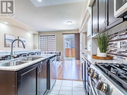 12 Merrybrook Trail, Brampton, ON - Indoor Photo Showing Kitchen With Double Sink