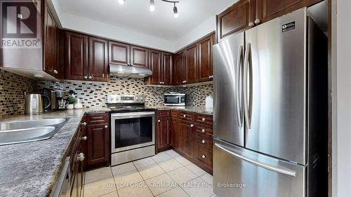 64 Eddington Place, Vaughan, ON - Indoor Photo Showing Kitchen With Double Sink With Upgraded Kitchen