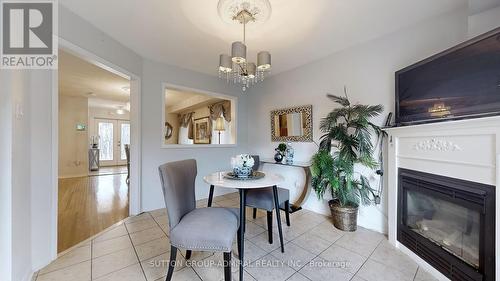 64 Eddington Place, Vaughan, ON - Indoor Photo Showing Dining Room With Fireplace