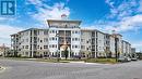 118 - 50 Lakebreeze Drive, Clarington, ON  - Outdoor With Balcony With Facade 