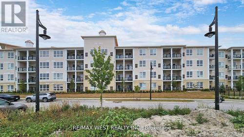 118 - 50 Lakebreeze Drive, Clarington, ON - Outdoor With Balcony With Facade