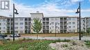 118 - 50 Lakebreeze Drive, Clarington, ON  - Outdoor With Balcony With Facade 