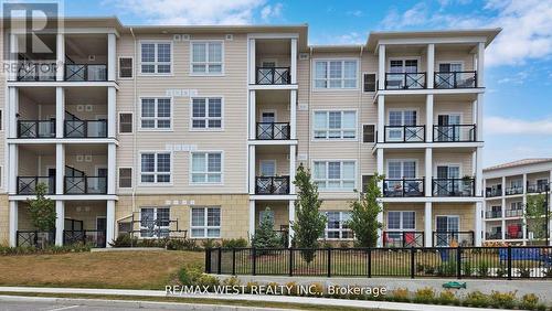 118 - 50 Lakebreeze Drive, Clarington, ON - Outdoor With Balcony With Facade